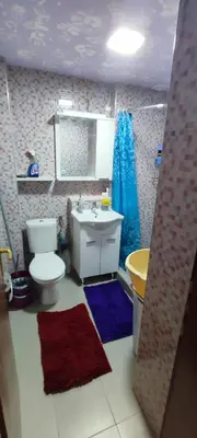 a bathroom with a toilet and a sink at Sutomore apartman in Sutomore