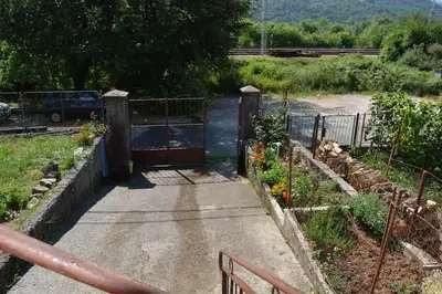 an entrance to a garden with a gate at B&B Ana in Virpazar
