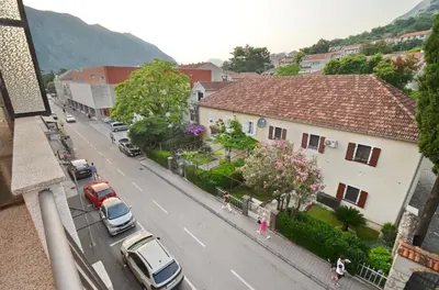 an aerial view of a city street with cars parked at Central Art Oasis Kotor in Kotor