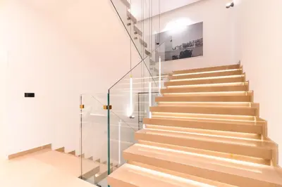 a staircase in a house with glass railings at Miramar in Ulcinj