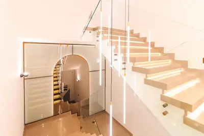a staircase in a house with a glass wall at Miramar in Ulcinj