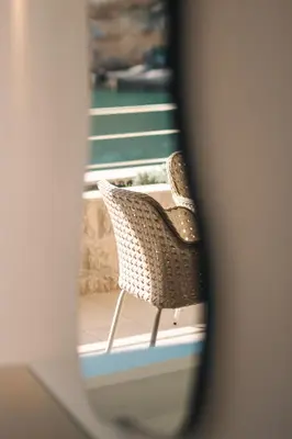 a view of two chairs on a balcony at Miramar in Ulcinj