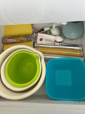 a green bowl and a plate in a refrigerator at Lake Skadar Paradise in Podgorica