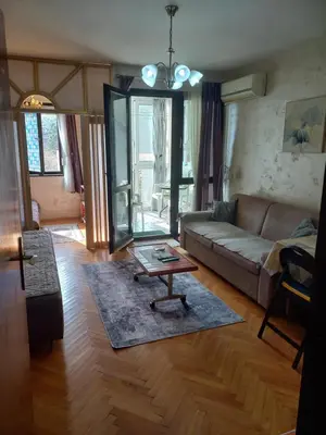 a living room with a couch and a coffee table at STELLA di mare in Sutomore