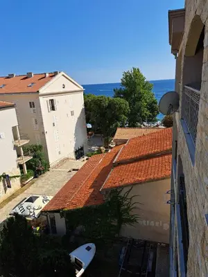 an overhead view of a building with red tile roofs at Petrovac Studio Apartment Ana in Petrovac na Moru