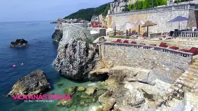 a view of the ocean and a rocky cliff at Apartments & Rooms Villa Anastasija in Ulcinj