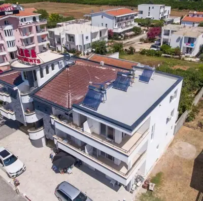 an aerial view of a large white building at Villa Draga in Ulcinj