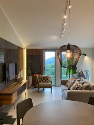 a living room with a couch and a table at The View apartment 2 in Petrovac na Moru