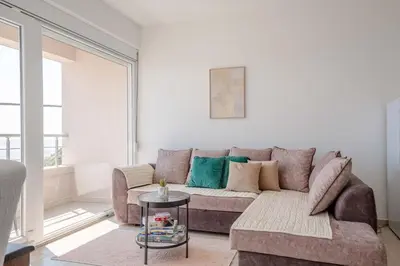 a living room with a couch and a table at Apartments BABKO in Bar