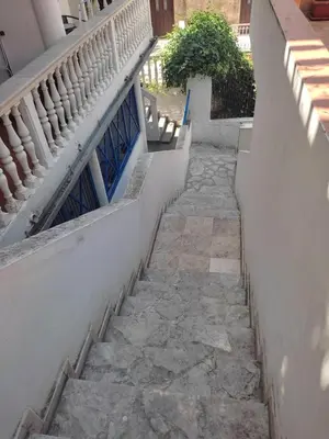 a set of stairs leading up to a building at Aloft Apartment in Budva