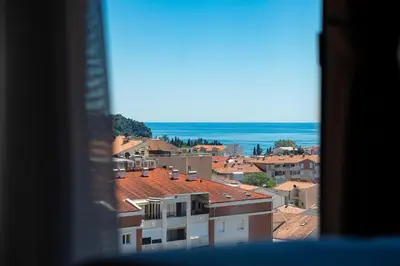 a view from a window of a city at Rooftop Apartments & Rooms in Budva
