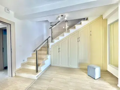 an empty hallway with stairs in a house at Villa Petra Zagora in Zagora