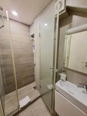 a bathroom with a shower and a sink at Filip Deluxe Rooms in Kotor