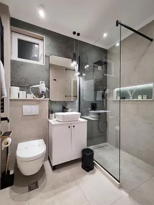 a bathroom with a toilet and a sink and a shower at AMD Premium rooms Budva in Budva