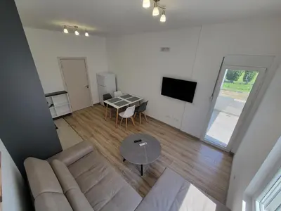an overhead view of a living room with a couch and a table at Angie's in Ulcinj