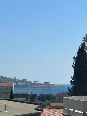 a view of the water from the roof of a building at Apartman Andrea in Bar