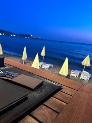 a picnic table with a view of the beach at Apartman Andrea in Bar