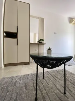 a table in the middle of a living room at Casa Gazi in Ulcinj