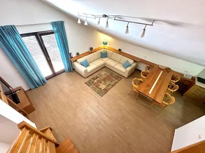 an overhead view of a living room with a couch at PalmOliva in Rafailovici