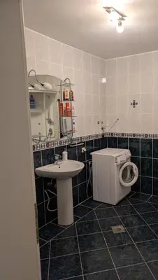 a bathroom with a toilet and a sink at Vila Anja in Dobra Voda