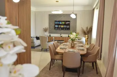a dining room with a table and chairs at Boka Devine Residence in Kotor