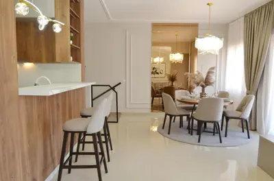 a kitchen and dining room with a table and chairs at Boka Devine Residence in Kotor