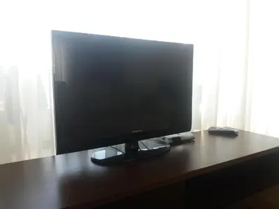 a computer monitor sitting on top of a desk at Sofia apartment in Budva