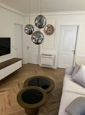 a living room with a couch and a table at Sunshine of Montenegro - Luxury in Kotor