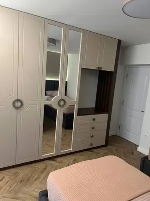 a bedroom with a dresser and a large mirror at Sunshine of Montenegro - Luxury in Kotor