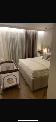 a bedroom with a large bed and a box at Sunshine of Montenegro - Luxury in Kotor