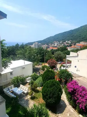 an aerial view of a park with benches and flowers at Summer Apartment Petrovac in Petrovac na Moru