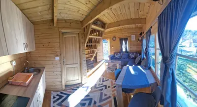 a view of a kitchen in a tiny house at Brvnara RIĆKI in Cetinje