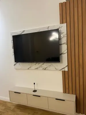 a flat screen tv hanging on a wall at Apartman Sun in Ulcinj