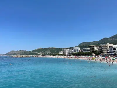 a group of people on a beach in the water at Villa Sunshine in Bar