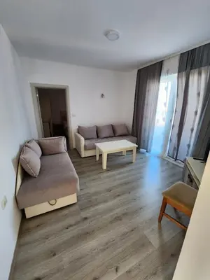 a living room with a couch and a table at Apartment FLORA in Bregvija