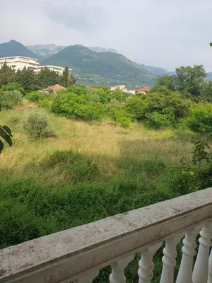 a balcony with a view of a field and mountains at Villa Blanca in Bar