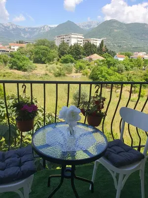 a table and chairs on a balcony with a view at Villa Blanca in Bar