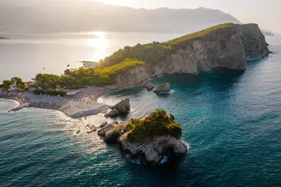 an island in the middle of the ocean at Alessandra Apartments in Sveti Stefan