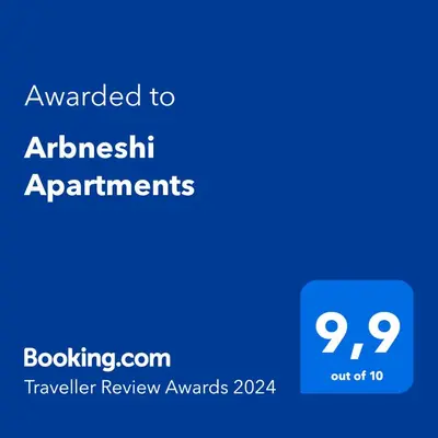 a blue text box with the words awarded to austbush applicants at Arbneshi Apartments in Ulcinj