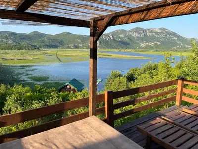 a view of a lake from the porch of a house at LAKE VIEW PREVLAKA in Cetinje