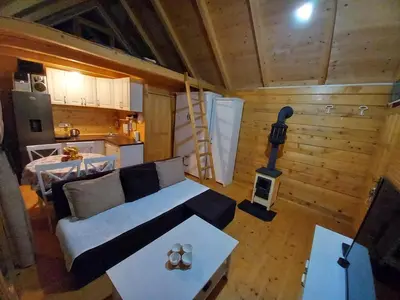an overhead view of a living room and kitchen in a cabin at LAKE VIEW PREVLAKA in Cetinje