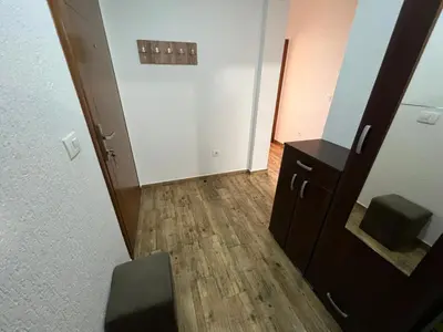 an empty room with a mirror and a dressing room at Apartment Sea View Dobra Voda in Dobra Voda