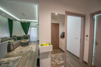 a living room with a couch and a table at Apartment Lara in Ulcinj