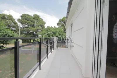 a balcony in a building with a view of trees at Vila Mikeli in Podgorica