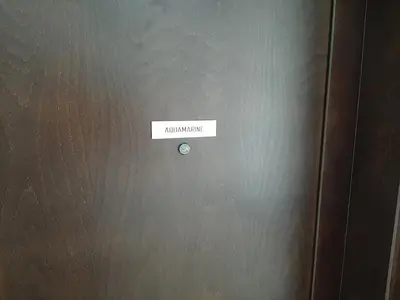 a sticker on the side of a brown refrigerator at Beautiful flat with sea view Aquamarine in Kotor