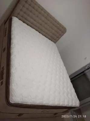 a mattress in a box on the ceiling of a room at Apartments Exclusive in Ulcinj