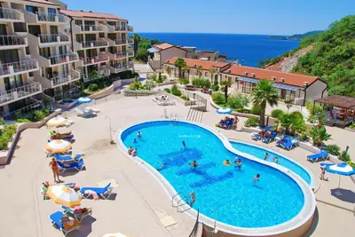 an image of a swimming pool at a resort at Montetrest Apartments in Sveti Stefan
