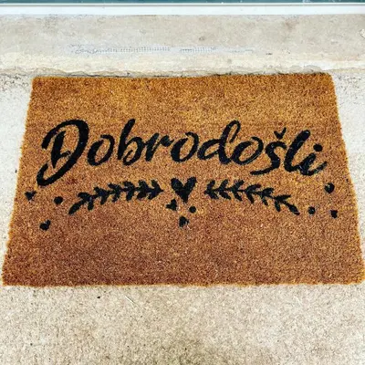 a welcome mat with the word dodrothroth written on it at Bungalow for 2 - Dream Oasis Dobra Voda in Dobra Voda