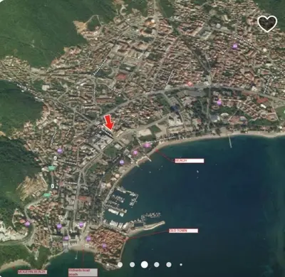 a map of a city next to a body of water at Apartment Butua. in Budva