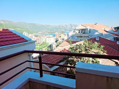 a view of a city from a balcony at Apartman Bravo Budva in Budva